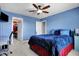 Comfortable bedroom with a ceiling fan and ample natural light at 13836 Fieldcrest Dr, McCordsville, IN 46055
