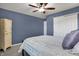 Stylish bedroom featuring neutral colored walls, carpet flooring, and a ceiling fan at 13836 Fieldcrest Dr, McCordsville, IN 46055
