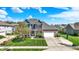 Charming two-story brick home with a well-manicured lawn and inviting curb appeal at 13836 Fieldcrest Dr, McCordsville, IN 46055