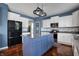 Well-appointed kitchen with a central island, stainless steel appliances, and pantry at 13836 Fieldcrest Dr, McCordsville, IN 46055