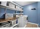 Well-organized laundry room with modern appliances and ample storage space at 13836 Fieldcrest Dr, McCordsville, IN 46055