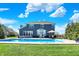 A stunning in-ground swimming pool features a basketball hoop and an expansive patio, perfect for outdoor entertaining at 13836 Fieldcrest Dr, McCordsville, IN 46055