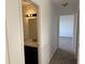 Hall bathroom featuring a modern vanity with marble top and decorative lighting at 1539 Egret Ln, Greenwood, IN 46143
