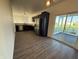 Bright kitchen with stainless steel appliances and adjacent screened-in porch at 1539 Egret Ln, Greenwood, IN 46143