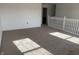 Upstairs landing with neutral carpeting, natural light, and access to bedrooms at 1539 Egret Ln, Greenwood, IN 46143