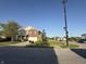 Two-story brick home with well-manicured lawn and mature trees on a quiet residential street at 1539 Egret Ln, Greenwood, IN 46143
