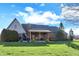 A spacious backyard featuring a well-maintained lawn and mature trees at 16 Cattail Ln, Brownsburg, IN 46112