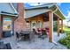 Spacious outdoor patio with cedar beams, ample seating, perfect for entertaining and relaxing at 16 Cattail Ln, Brownsburg, IN 46112