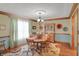 Charming dining room featuring a wood table, decorative accents, and natural light at 16 Cattail Ln, Brownsburg, IN 46112