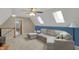 Bonus room features plush carpeting, a ceiling fan, comfortable seating, and natural light at 16 Cattail Ln, Brownsburg, IN 46112