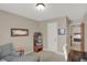 Office featuring gray chaise lounge, a desk, and natural lighting at 16 Cattail Ln, Brownsburg, IN 46112