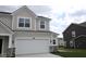 Exterior of new construction home with a two-car garage and gray accents at 16830 Silo Meadows Dr, Noblesville, IN 46060