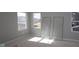 Bright room with large windows offers a blank canvas for customization at 16830 Silo Meadows Dr, Noblesville, IN 46060
