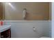 Half bathroom featuring white wainscotting and a small vanity at 18980 Bladed Mills Dr, Noblesville, IN 46062