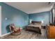Bedroom with blue walls and hard surface floors at 18980 Bladed Mills Dr, Noblesville, IN 46062
