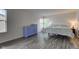 Bedroom featuring hard surface floors, natural light, and furniture at 18980 Bladed Mills Dr, Noblesville, IN 46062