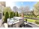 Relax in the backyard's in-ground hot tub surrounded by lush landscaping at 19311 Morrison Way, Noblesville, IN 46060