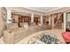 Finished basement boasts theater seating, a foosball table, and a full bar area for entertaining at 19311 Morrison Way, Noblesville, IN 46060