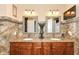 Bathroom showcasing double sink vanity, decorative tile, and spacious layout at 19311 Morrison Way, Noblesville, IN 46060