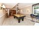 Enjoy a billiard table in the finished basement's entertainment area at 19311 Morrison Way, Noblesville, IN 46060