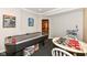 Spacious game room featuring air hockey, checkers, and easy access to the theater room at 19311 Morrison Way, Noblesville, IN 46060