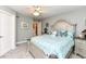 Inviting main bedroom with a king-size bed, silver accents, and natural light, perfect for relaxation at 19311 Morrison Way, Noblesville, IN 46060