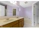 Bathroom with double vanity, tile floors, and a soaking tub at 2020 Tourmaline Dr, Westfield, IN 46074