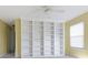 Bedroom with a large built-in bookcase, neutral carpet and paint, and a ceiling fan at 2020 Tourmaline Dr, Westfield, IN 46074