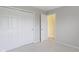 Bedroom with grey walls, carpet, and large closet with sliding doors at 2020 Tourmaline Dr, Westfield, IN 46074