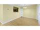 Bright dining room featuring updated lighting and pass through to kitchen at 2020 Tourmaline Dr, Westfield, IN 46074