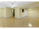 Open-concept living area with hardwood floors, leading to the kitchen and dining space at 2020 Tourmaline Dr, Westfield, IN 46074