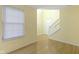 Open living space with hardwood floors, a staircase, and a bright, airy atmosphere at 2020 Tourmaline Dr, Westfield, IN 46074
