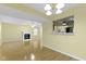 Spacious living room featuring a fireplace and access to the kitchen at 2020 Tourmaline Dr, Westfield, IN 46074