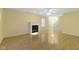 Cozy living room featuring a fireplace, hardwood floors, and ample natural light at 2020 Tourmaline Dr, Westfield, IN 46074