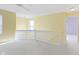 Open loft area with neutral carpet and paint, white railings, and natural light at 2020 Tourmaline Dr, Westfield, IN 46074
