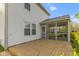 Rear exterior of the home with a screened in porch and wooden deck at 2020 Tourmaline Dr, Westfield, IN 46074