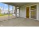 View of a screened-in porch with a door leading to the house at 2020 Tourmaline Dr, Westfield, IN 46074