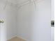 Walk-in closet with white walls and wire shelving for storage at 2020 Tourmaline Dr, Westfield, IN 46074