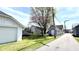View of the backyard with two detached garages and a trampoline at 2022 Indiana Ave, Columbus, IN 47201