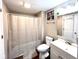 Neutral toned bathroom with bath tub, shower and vanity sink at 2022 Indiana Ave, Columbus, IN 47201