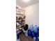 View of pantry with wire shelving, containing food and storage containers at 2022 Indiana Ave, Columbus, IN 47201
