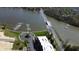 Stunning aerial view of the lake and condo featuring a lakeside community at 20971 Shoreline Ct # 305, Noblesville, IN 46062