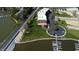 Aerial shot of complex near waterfront, with beautiful landscaping and parking at 20971 Shoreline Ct # 305, Noblesville, IN 46062