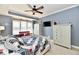 Bedroom with a bench seat by the window overlooking the lake at 20971 Shoreline Ct # 305, Noblesville, IN 46062