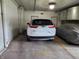 Parking spot in a parking garage featuring a parked white Honda CR-V at 20971 Shoreline Ct # 305, Noblesville, IN 46062