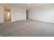 Large bright bedroom features neutral carpet and a spacious closet creating an open and airy atmosphere at 210 Aster Way, Greenfield, IN 46140