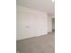 Bright bedroom featuring neutral carpet, double door closet and white trim at 210 Aster Way, Greenfield, IN 46140