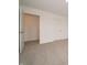 Bright bedroom features a closet and a passageway to a different room at 210 Aster Way, Greenfield, IN 46140