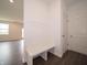 Hallway features a convenient built-in bench and coat rack for organization and style at 210 Aster Way, Greenfield, IN 46140