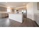 Spacious kitchen features an island, stainless appliances, and sleek cabinetry at 210 Aster Way, Greenfield, IN 46140